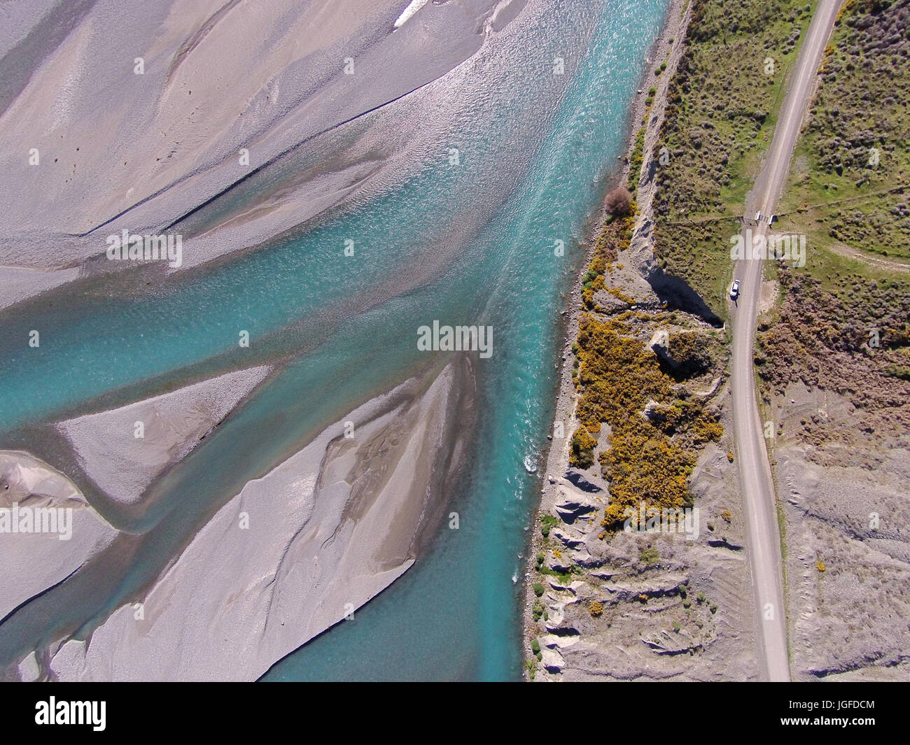 Braided streams of the Rakaia River, and Double Hill Run Road, Canterbury, South Island, New Zealand - drone aerial Stock Photo