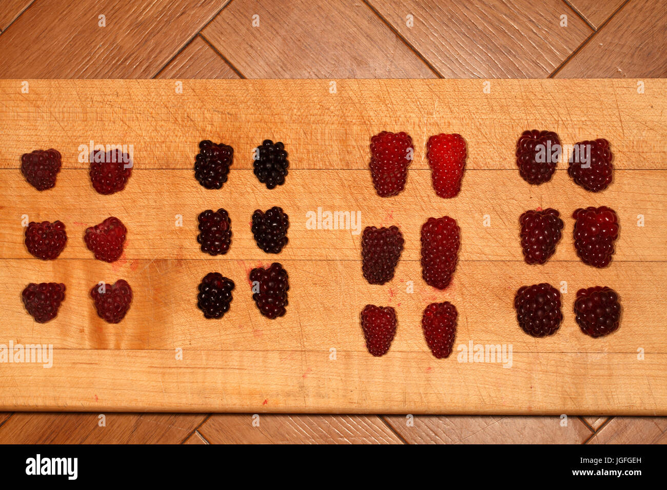 Soft fruit. Left to right, Raspberries, Boysenberries, Tayberries, Tummelberries. Stock Photo