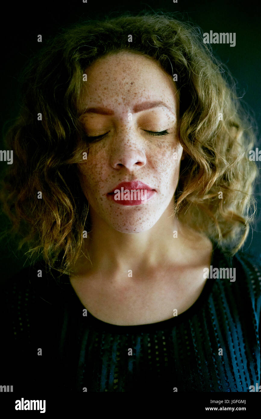 Woman eyes closed head up hires stock photography and images Alamy