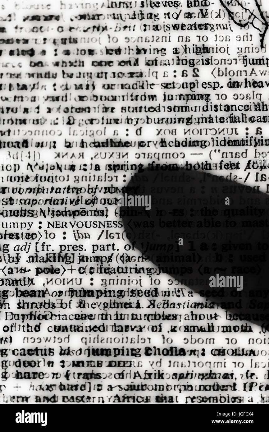 Silhouette of finger on encrypted message Stock Photo