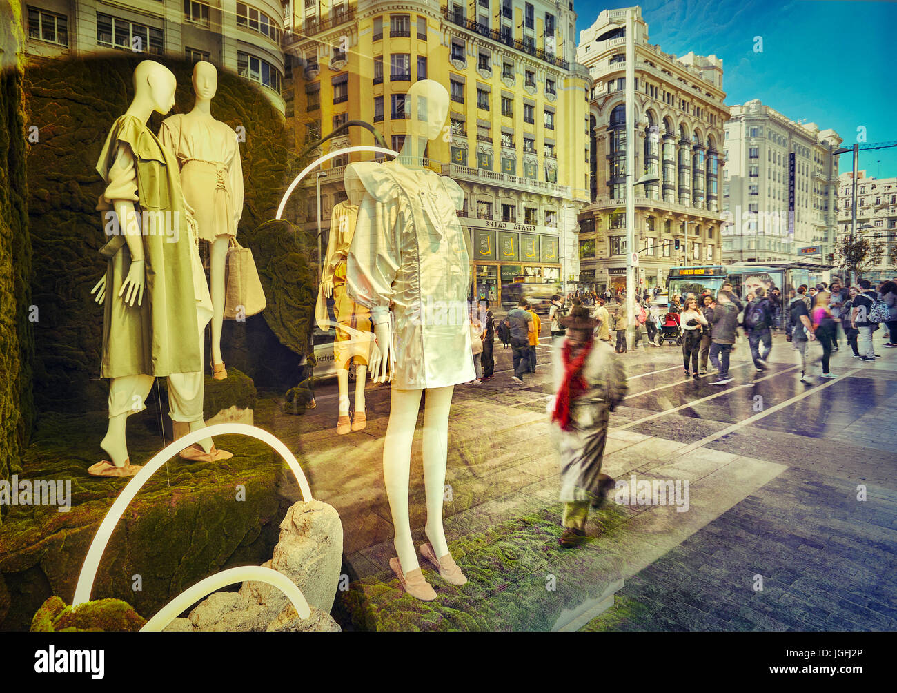 Mannequins and reflections at a window shop in Gran Via avenue. Madrid. Spain. Stock Photo