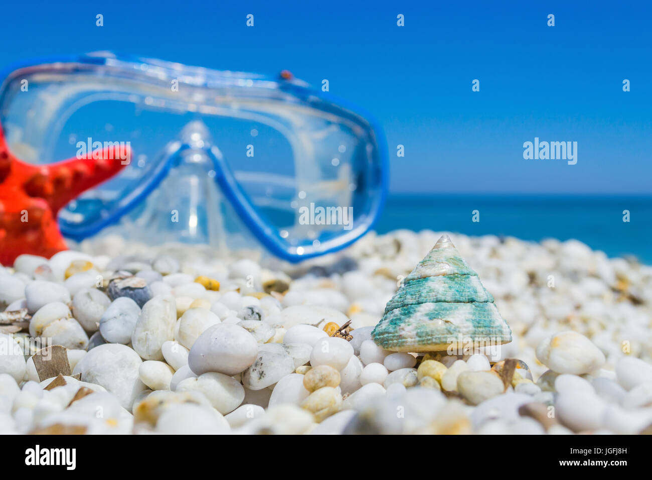 White pebbles and diving mask Stock Photo - Alamy