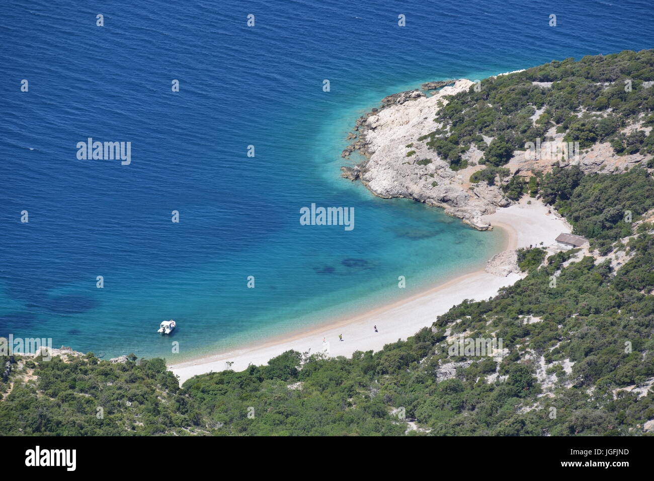Lubenice, Croatia - June 19, 2017 - Beach Sveti Ivan with boats and blue sky Stock Photo