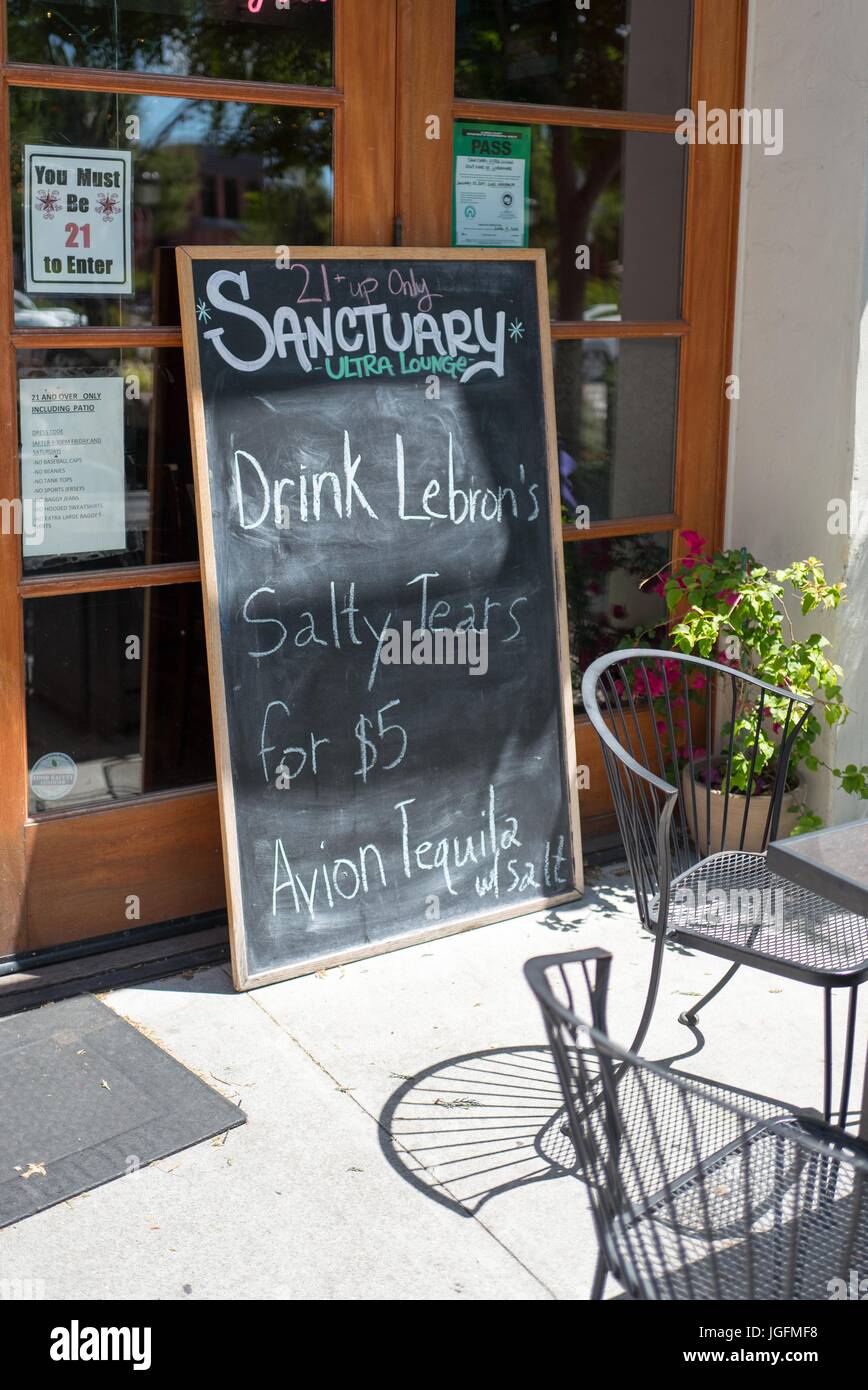 A sign outside a bar in Livermore, California invites visitors to 'Drink LeBron's Salty Tears', a comically named alcoholic drink celebrating the Golden State Warriors basketball team's victory over the Cleveland Cavaliers and basketball player LeBron James, June 12, 2017. Stock Photo