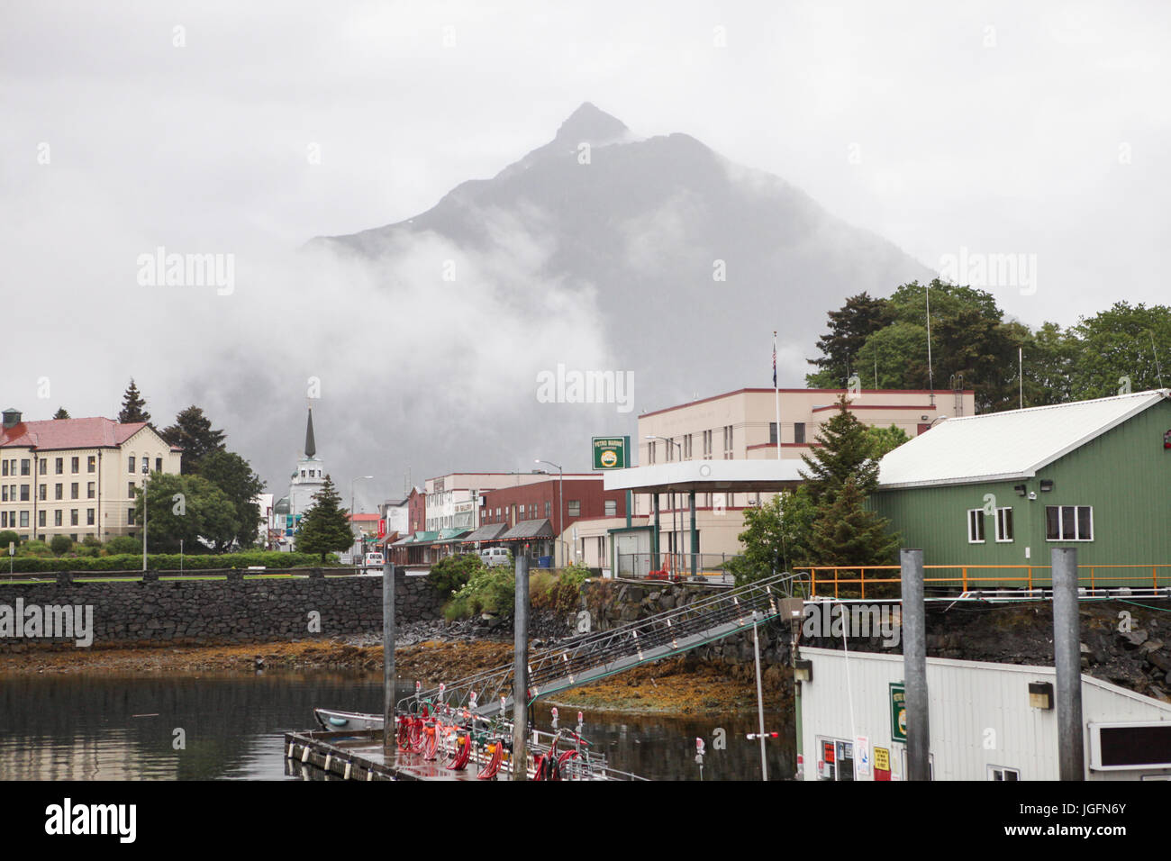 Gray clouds cover a mountain locaated near downtown Sitka, Alaska. Stock Photo