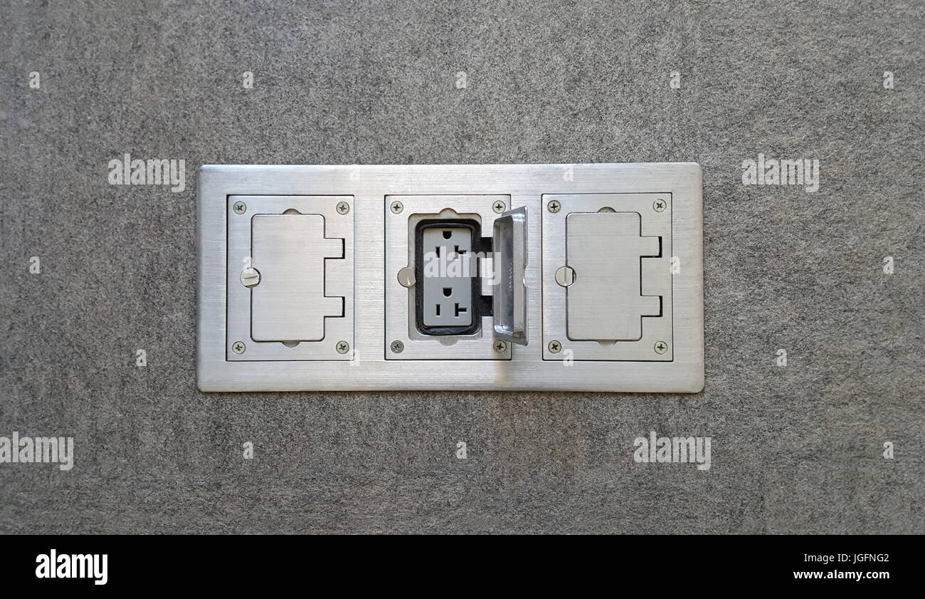 3 floor aluminum door double plug outlet sockets Stock Photo