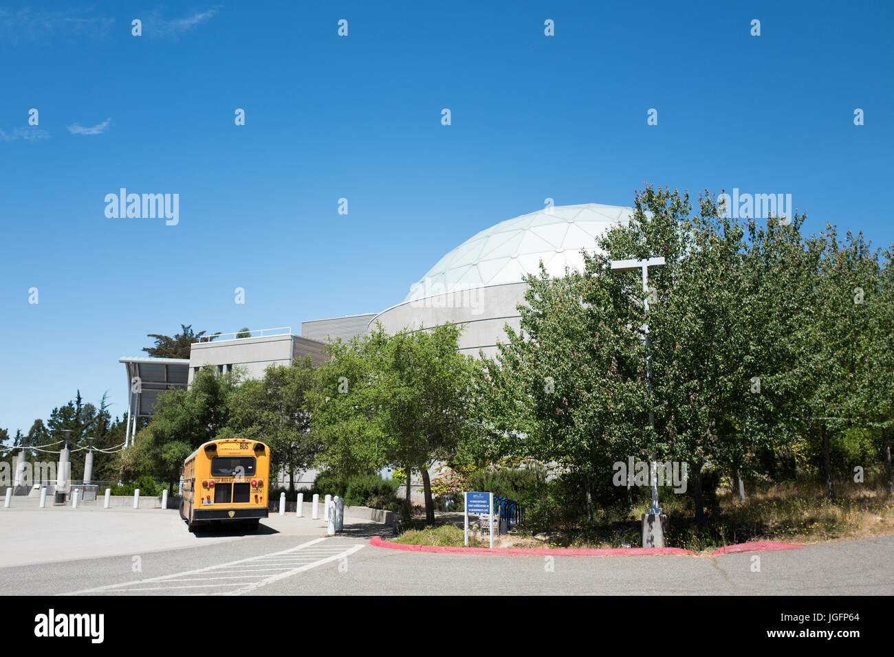 A school bus is parked in the circle at the Chabot Space and Science Center, a science museum and observatory in Oakland, California, June 15, 2017. Stock Photo