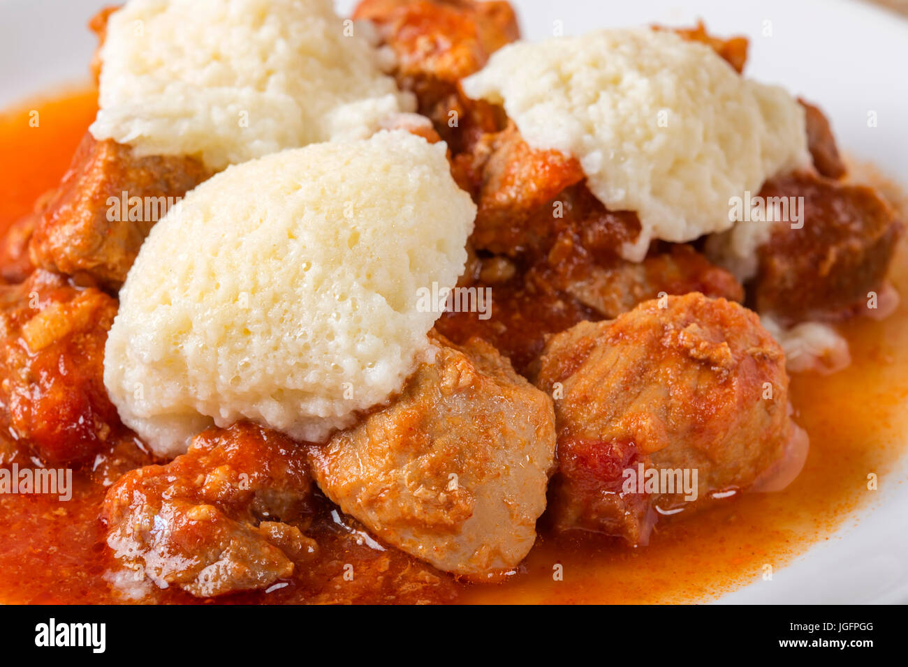 Classic goulash with dumplings, delicious heavy food, with dumplings