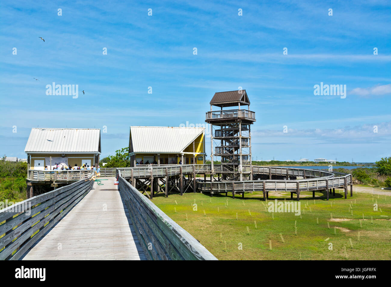 Louisiana, Jefferson Parish, Grand Isle State Park, observation tower overlooks fishing pier, children on field trip Stock Photo