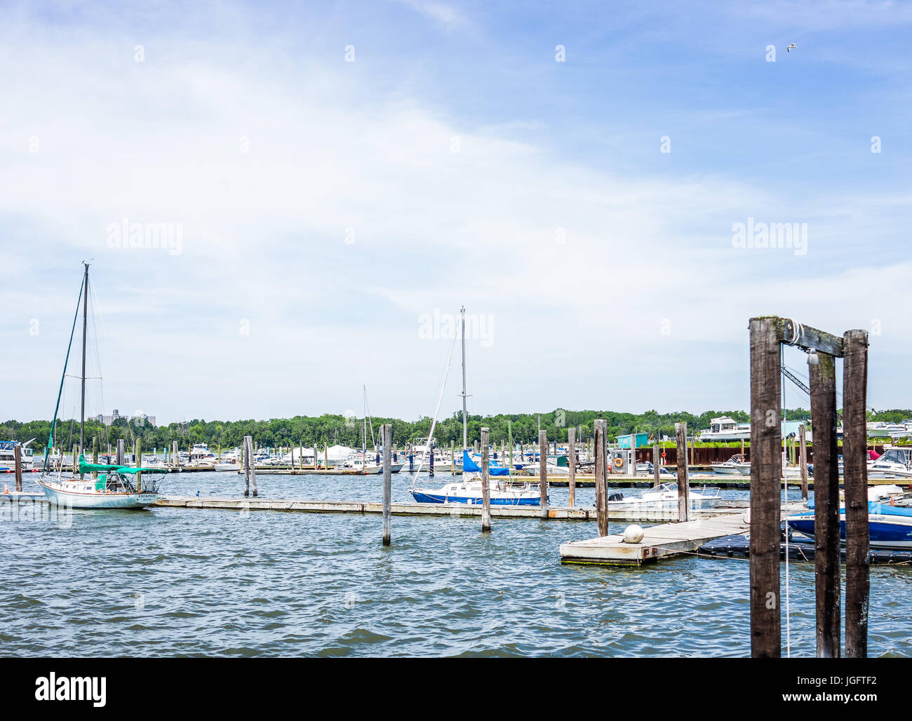 Bronx, USA - June 11, 2017: City Island harbor with boats and pier Stock Photo