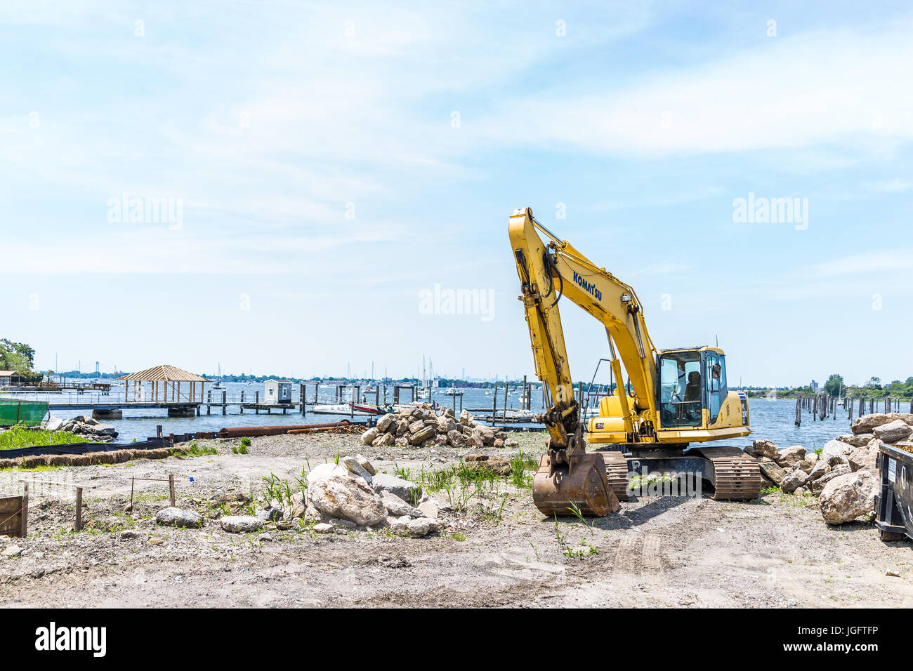 Bronx, USA - June 11, 2017: City Island harbor with boats and construction truck Stock Photo