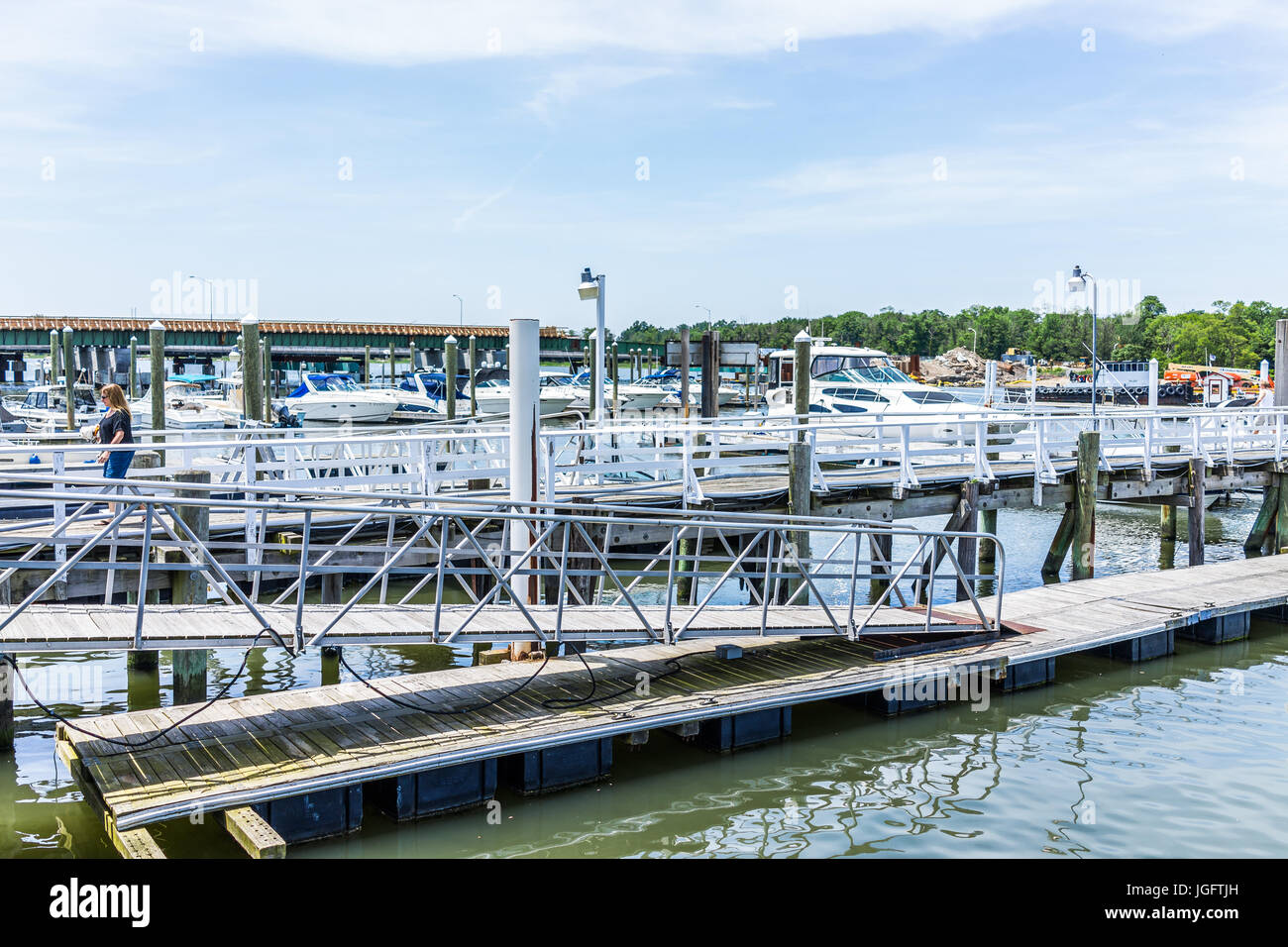 Bronx, USA - June 11, 2017: City Island harbor with boats and reflection Stock Photo