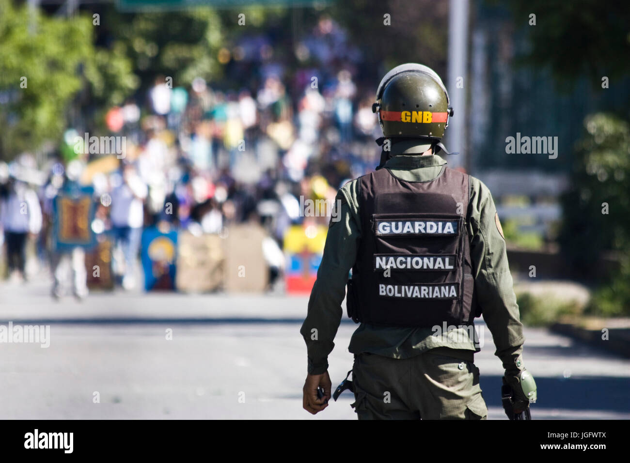 Members of the Bolivarian National Guard disperses demonstrators than try to take the Francisco Fajardo Higway in Caracas during "El Trancazo" Stock Photo