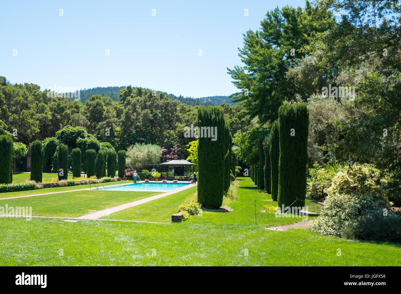 Swimming pool among formal gardens, added in 1945, at Filoli, a preserved country house, formal garden and estate operated by the National Trust for Historic Preservation in Woodside, California, June 23, 2017. Stock Photo