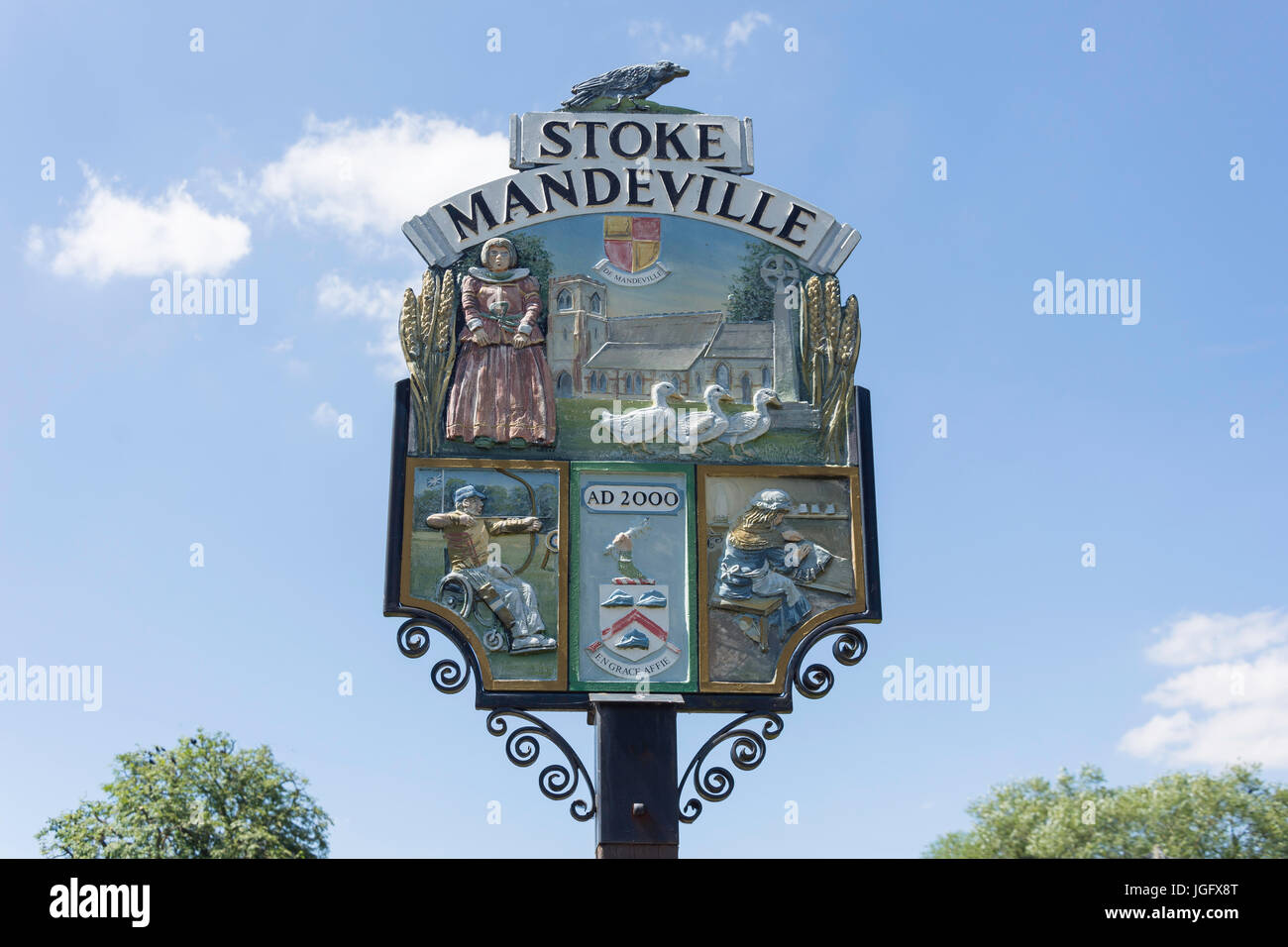Village sign on green, Stoke Mandeville, Buckinghamshire, England, United Kingdom Stock Photo