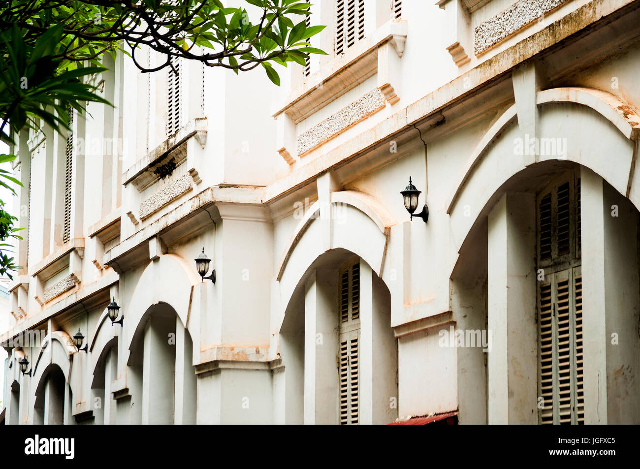 Newly renovated French colonial building, Setthatirath Road, Vientiane, Laos Stock Photo