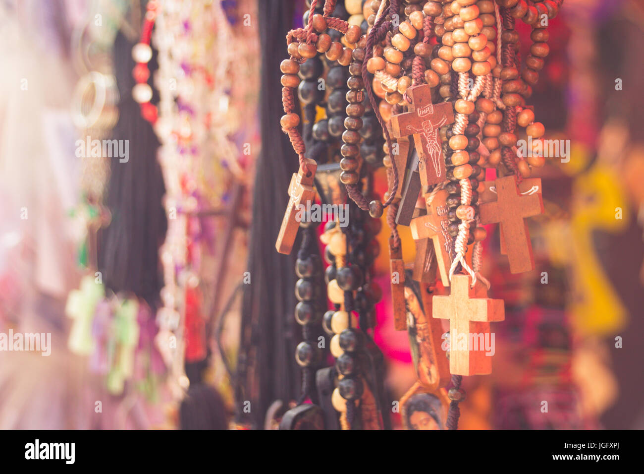 Photograph of some religious Rosaries at a market Stock Photo