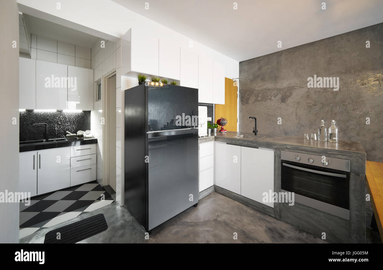 Modern,bright,clean,kitchen interior with concrete island in a loft style house , Interior photography. Stock Photo