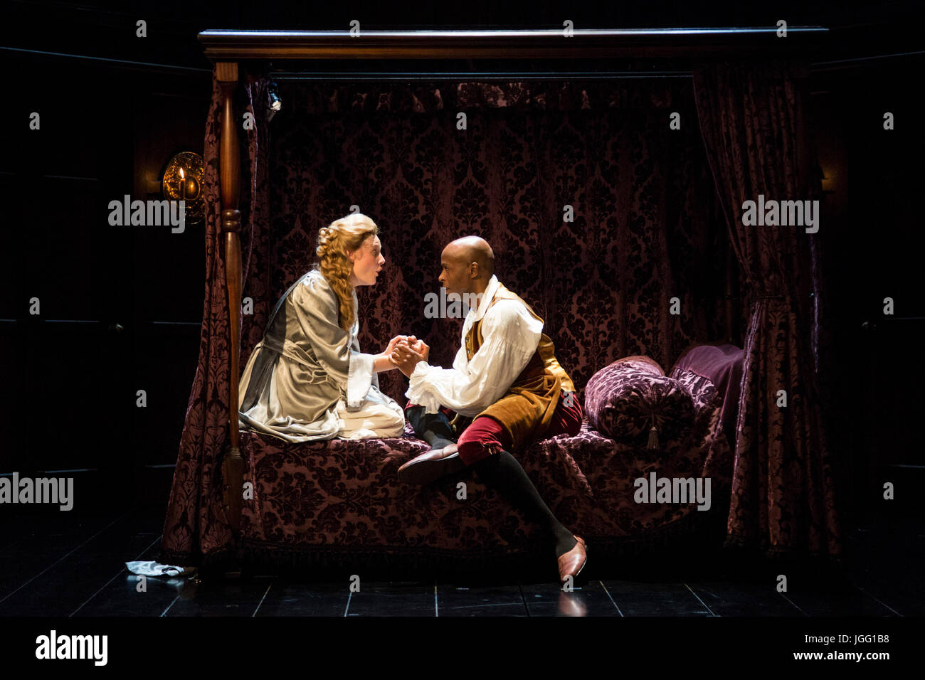 London, UK. 6th July, 2017. Romola Garai (Sarah Churchill) and Chu Omambala (John Churchill). After a sold out run at the Swan Theatre in Stratford-upon-Avon in 2015-16, the Royal Shakespeare Company production of Queen Anne transfers to the Theatre Royal Haymarket from 30 June for a thirteen week limited run until 30 September 2017. Queen Anne is a new play written by Helen Edmundson and directed by Natalie Abrahami. With Emma Cunniffe as Queen Anne/Princess Anne, Romola Garai as Sarah Churchill/Duchess of Marlborough. Credit: Bettina Strenske/Alamy Live News Stock Photo