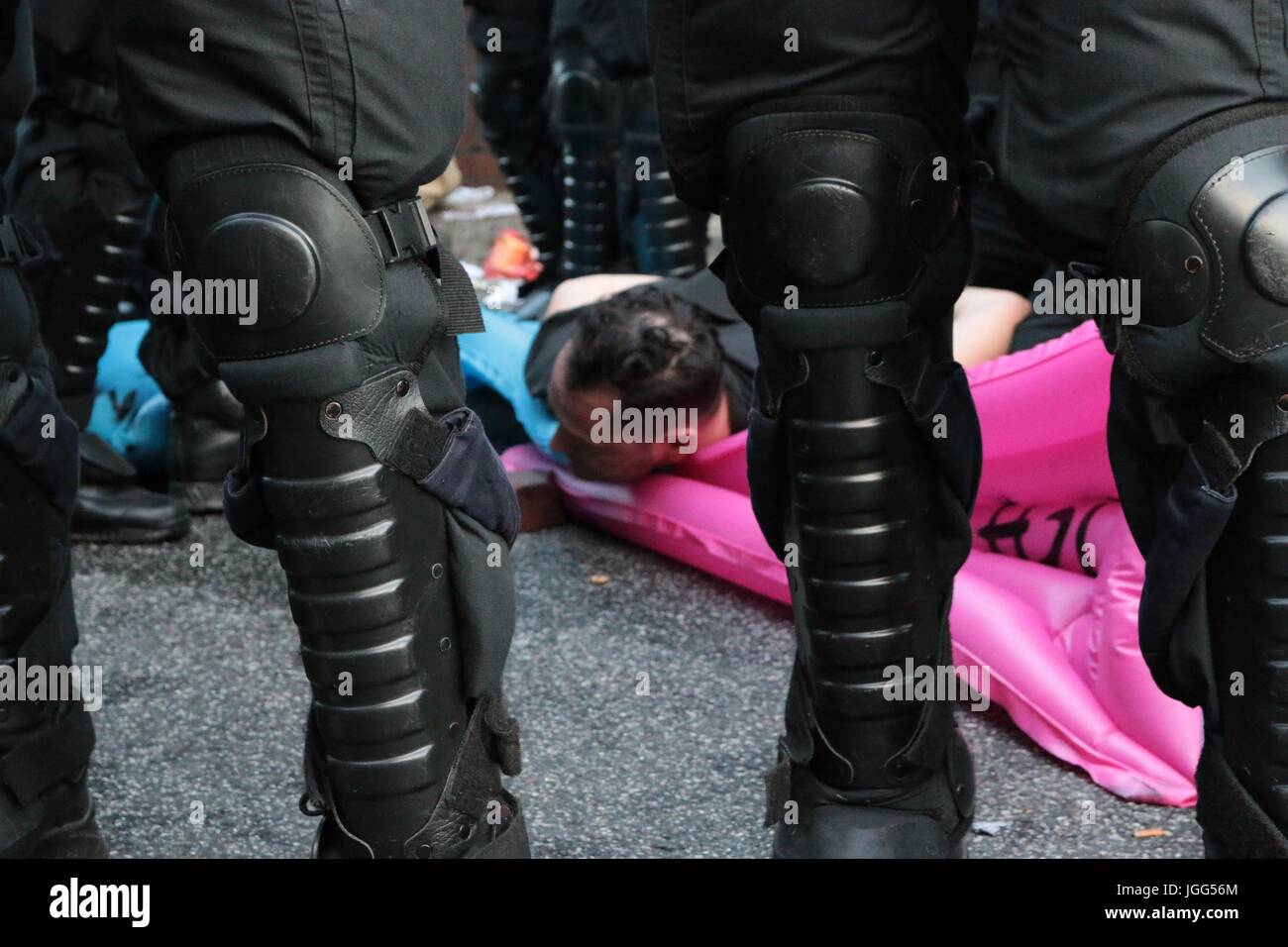 Hamburg, Germany. 6th July, 2017. A protester is arrested as violence breaks out at an anti g20 protest Credit: Conall Kearney/Alamy Live News Stock Photo