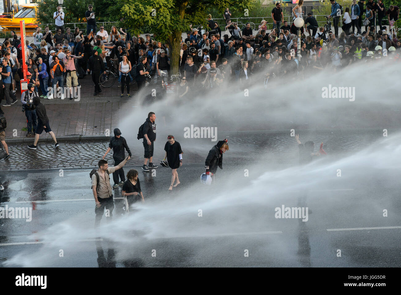 Hamburg, Germany. 6th July, 2017. protest rally 'G-20 WELCOME TO HELL' against G-20 summit , police actions with tear gas and water cannon against the black block with mummed radicals and extremists, Credit: Joerg Boethling/Alamy Live News Stock Photo