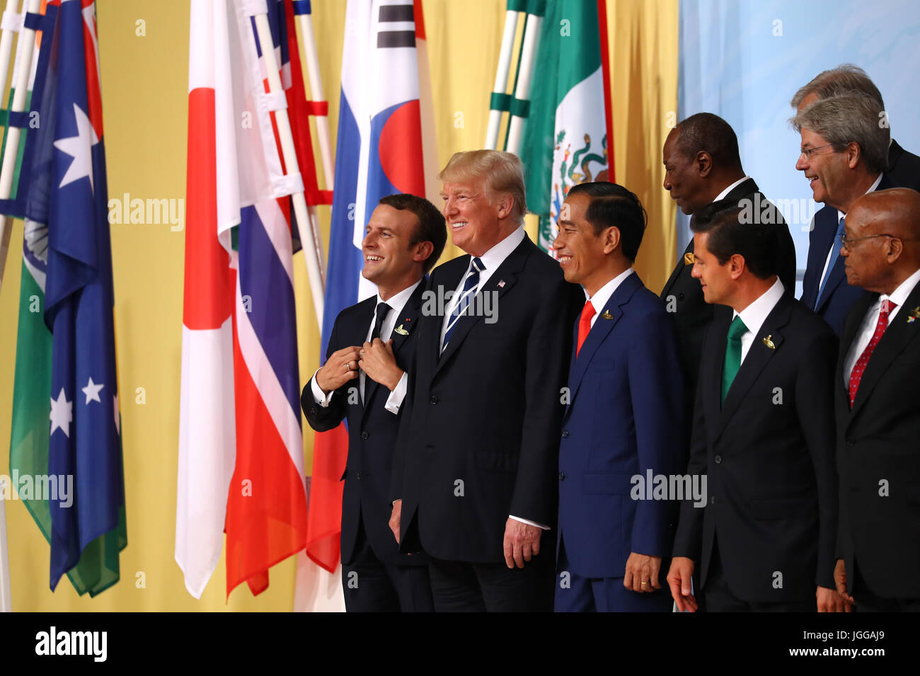 Hamburg, Germany. 7th July, 2017. L-R: French president Emmanuel Macron, American president Donald Trump, Indonesian president Joko Wododo, Mexican president Enrique Pena Nieta and South African president Jacob Zuma pose for a group photograph of the G20 leaders in Hamburg, Germany, 7 July 2017. The summit, a meeting of the governments of the twenty largest world economies, begins on the 7 July and concludes on the 8 July. Photo: Christian Charisius/dpa/Alamy Live News Stock Photo