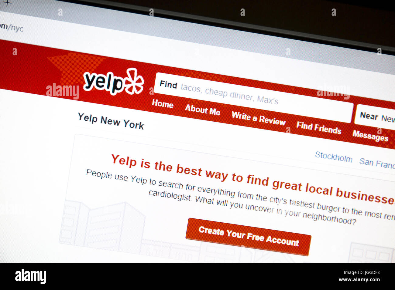 Yelp website on a computer screen. Yelp is an American multinational corporation which publish crowd-sourced review Stock Photo