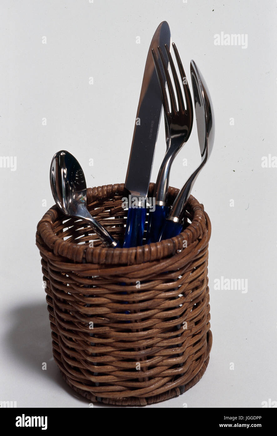 Stainless steel cutlery in basket Stock Photo Alamy
