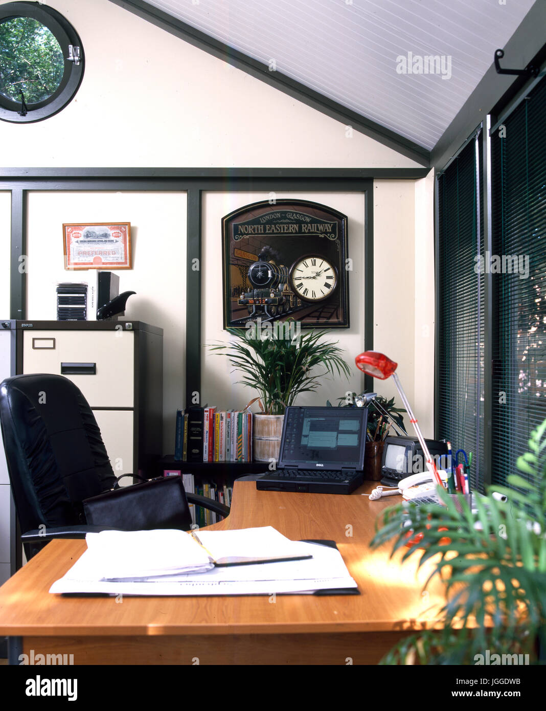 Inside a home office in the garden Stock Photo