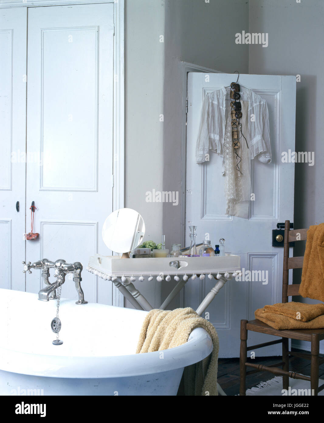 Grey and white traditional bathroom with rolltop tub Stock Photo Alamy