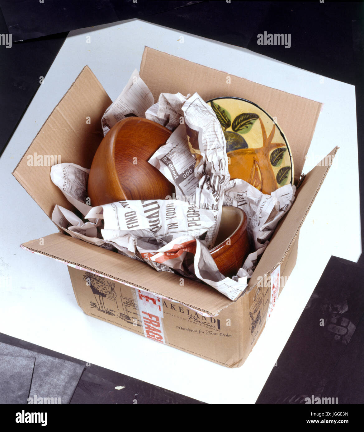 Packing crockery up for a move Stock Photo Alamy