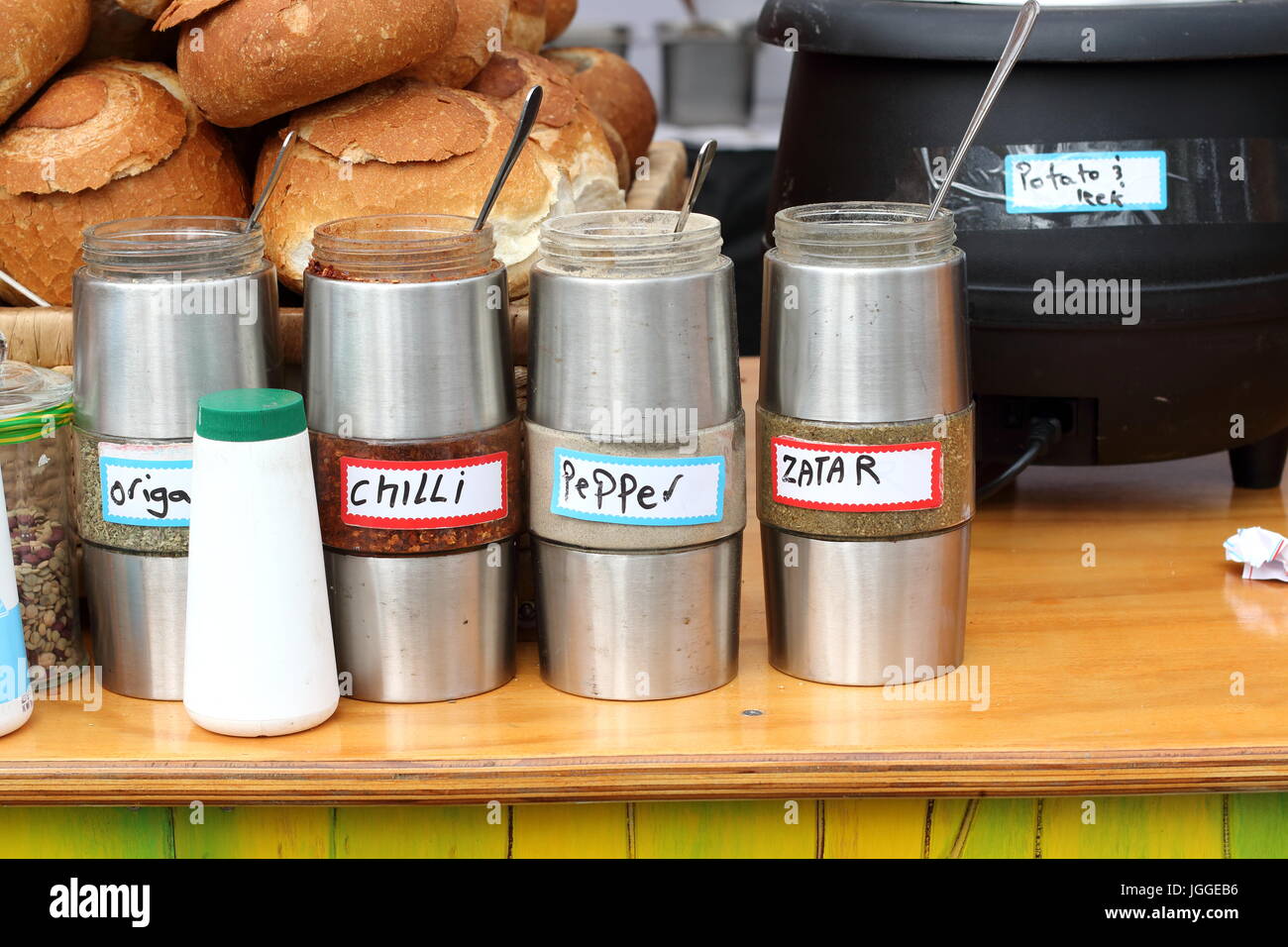 Food condiments in stainless steel jar Stock Photo Alamy