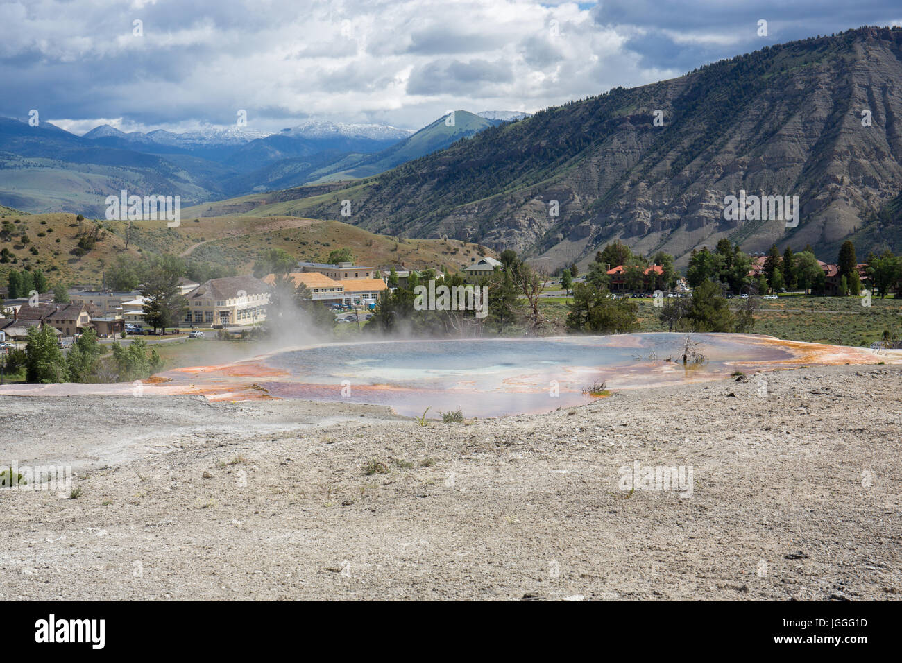 Top of Palette Spring with the town of Mammoth Hot Springs in the background, Yellowstone National Park Stock Photo