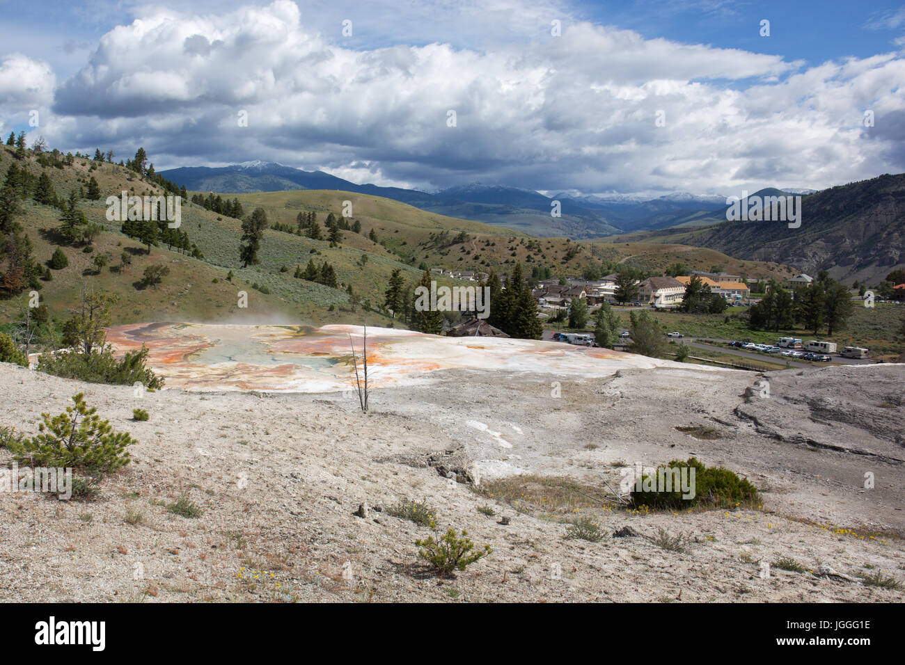 Top of Palette Spring with the town of Mammoth Hot Springs in the background, Yellowstone National Park Stock Photo