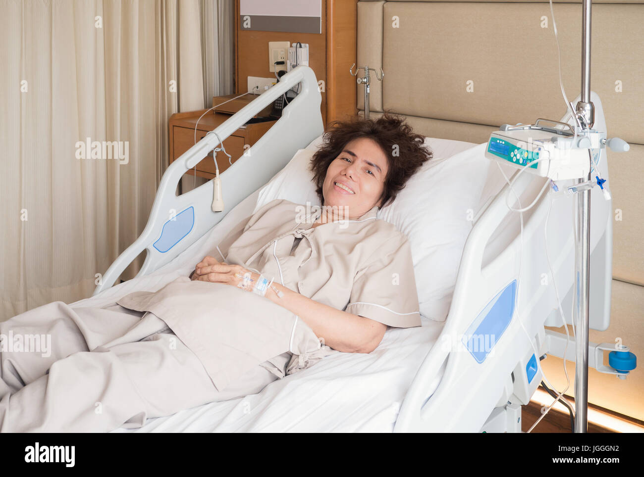 Elderly patient in hospital bed hi-res stock photography and images - Alamy