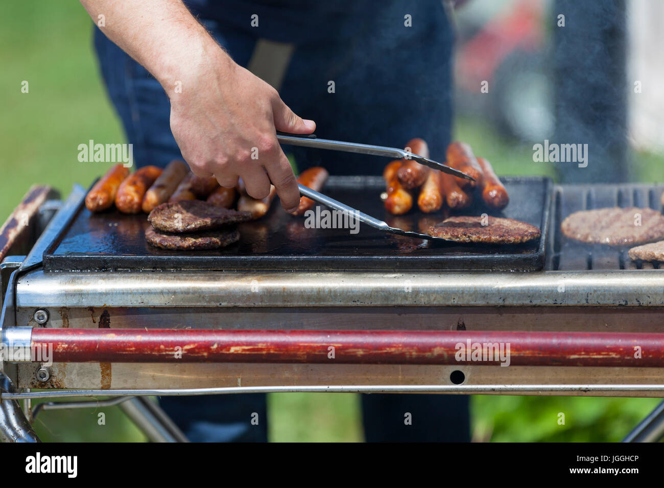 Grill tongs hi-res stock photography and images - Alamy