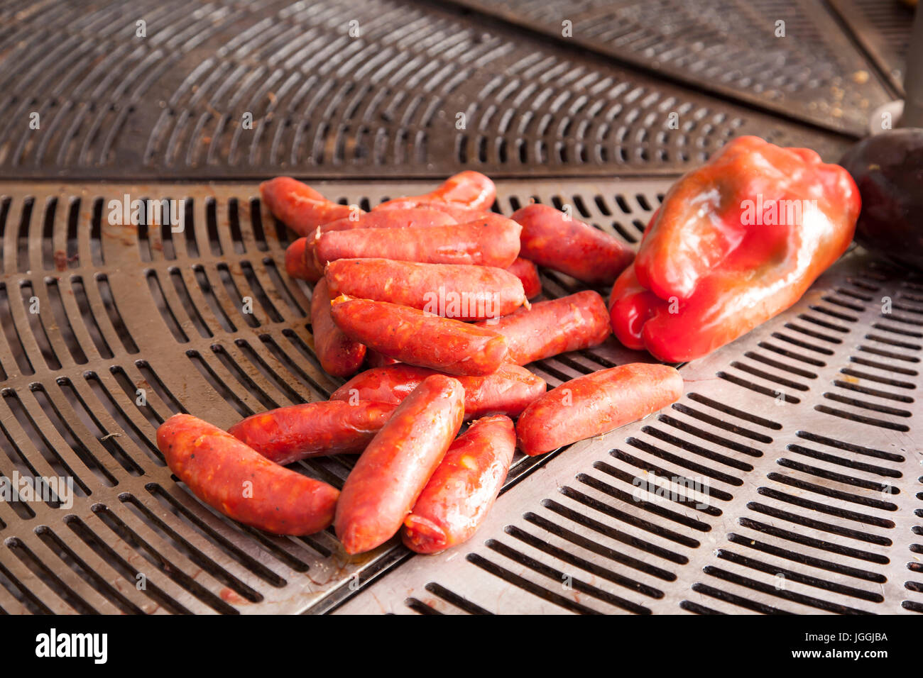 Traditional spanish chorizo sausage on the barbecue grill Stock Photo