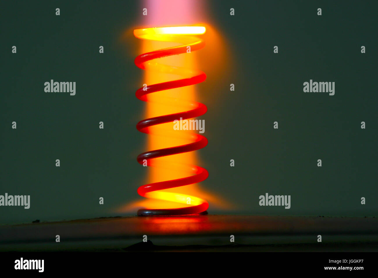 Red hot glowing steel spring Stock Photo Alamy