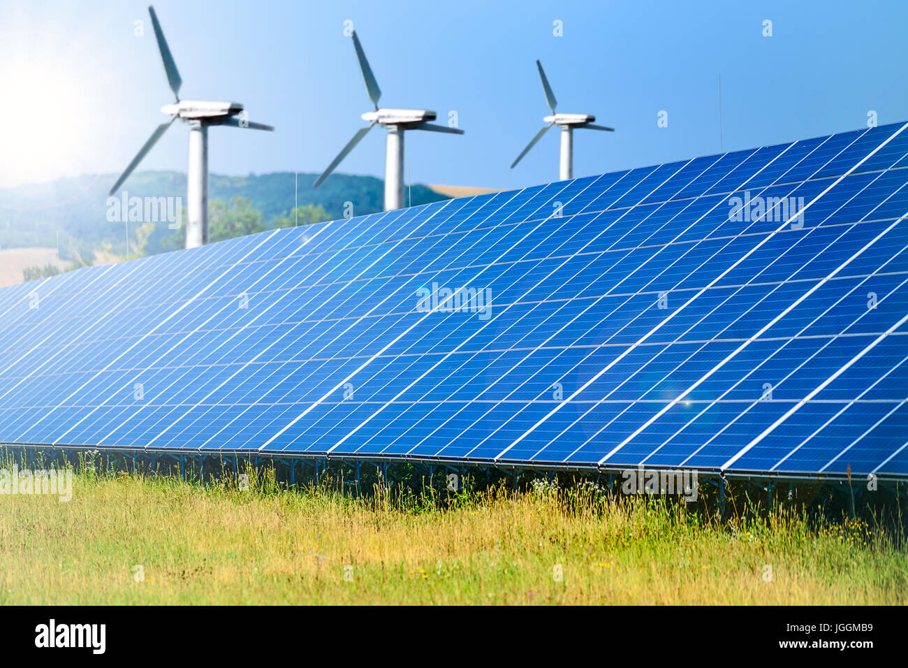 Composite image of renewable energy sources solar farm for