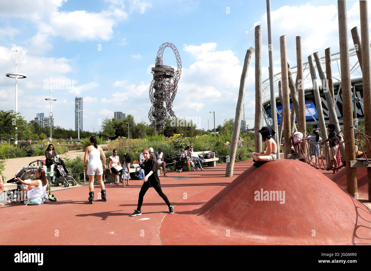 Childrens playground structure with kids playing in the Queen Elizabeth Olympic Park in Stratford, Newham East London England UK    KATHY DEWITT Stock Photo