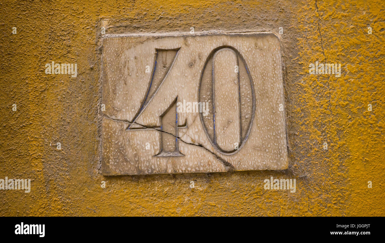 Addresses or street numbers on residential walls in Florence, Italy Stock Photo