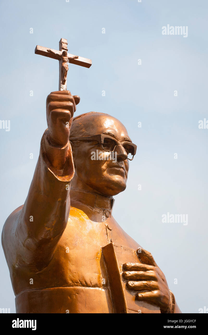 A golden statue of martyred Archbishop Oscar Romero across from the ...