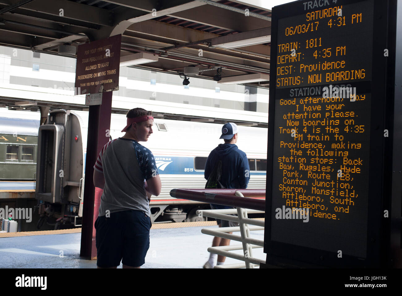 Departure board on track at South Station in Boston, Massachusetts. Stock Photo