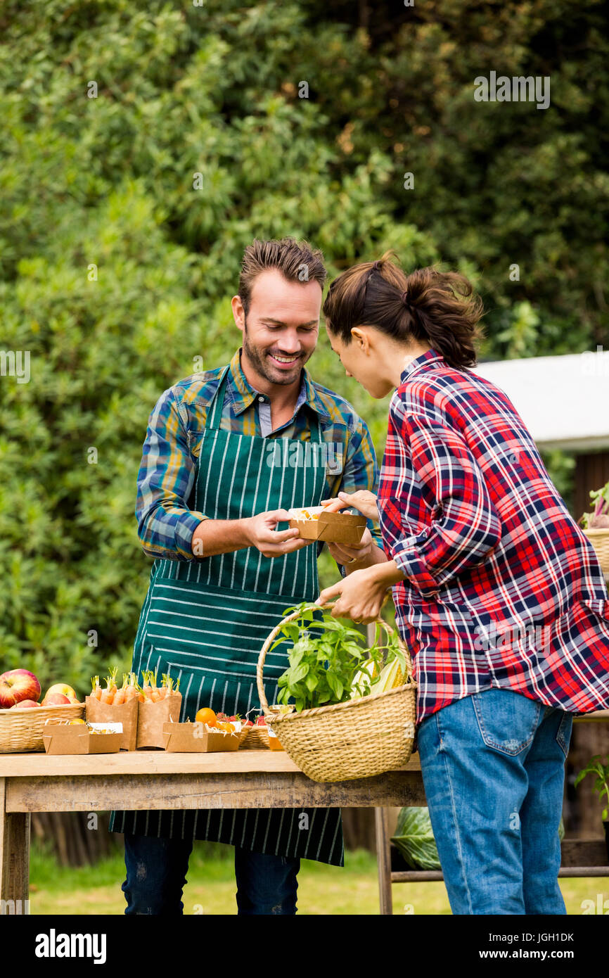 Young man selling fruit hi-res stock photography and images - Alamy