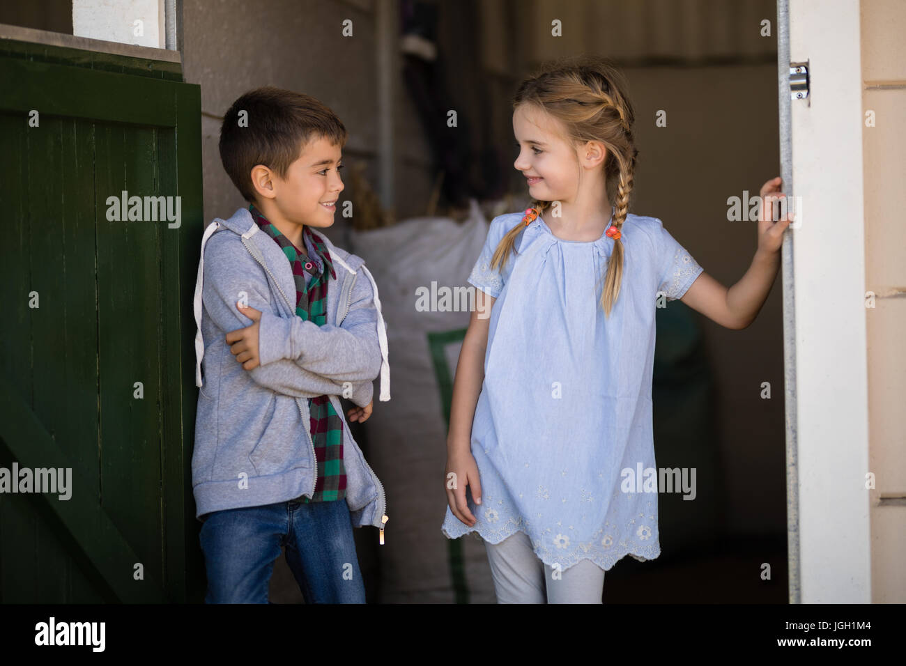 Boy and girl smiling at each other hi-res stock photography and images ...
