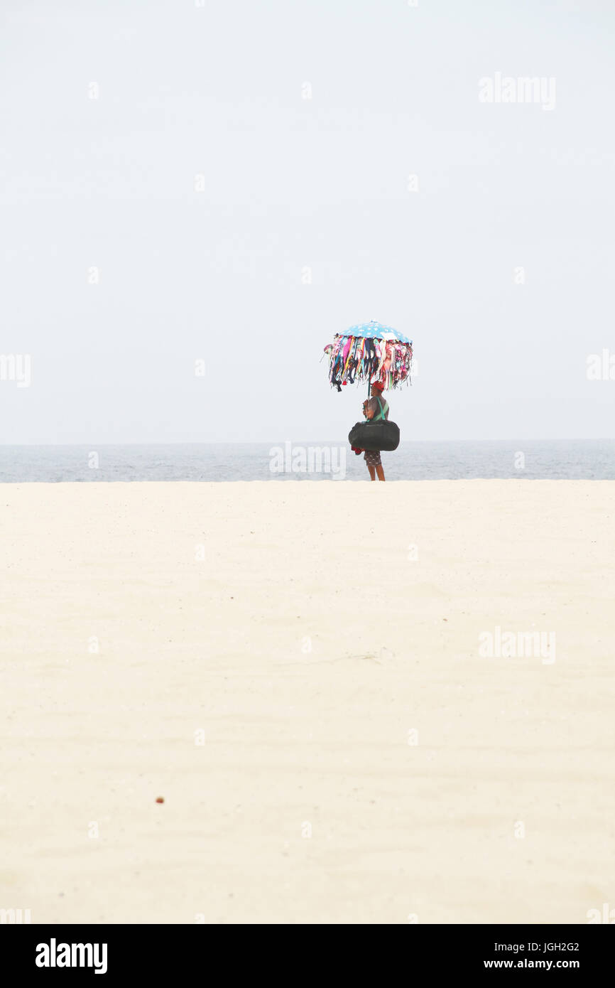 Seller, bikini, Copacabana beach; 2016; Copacabana, Rio de Janeiro, Brazil. Stock Photo