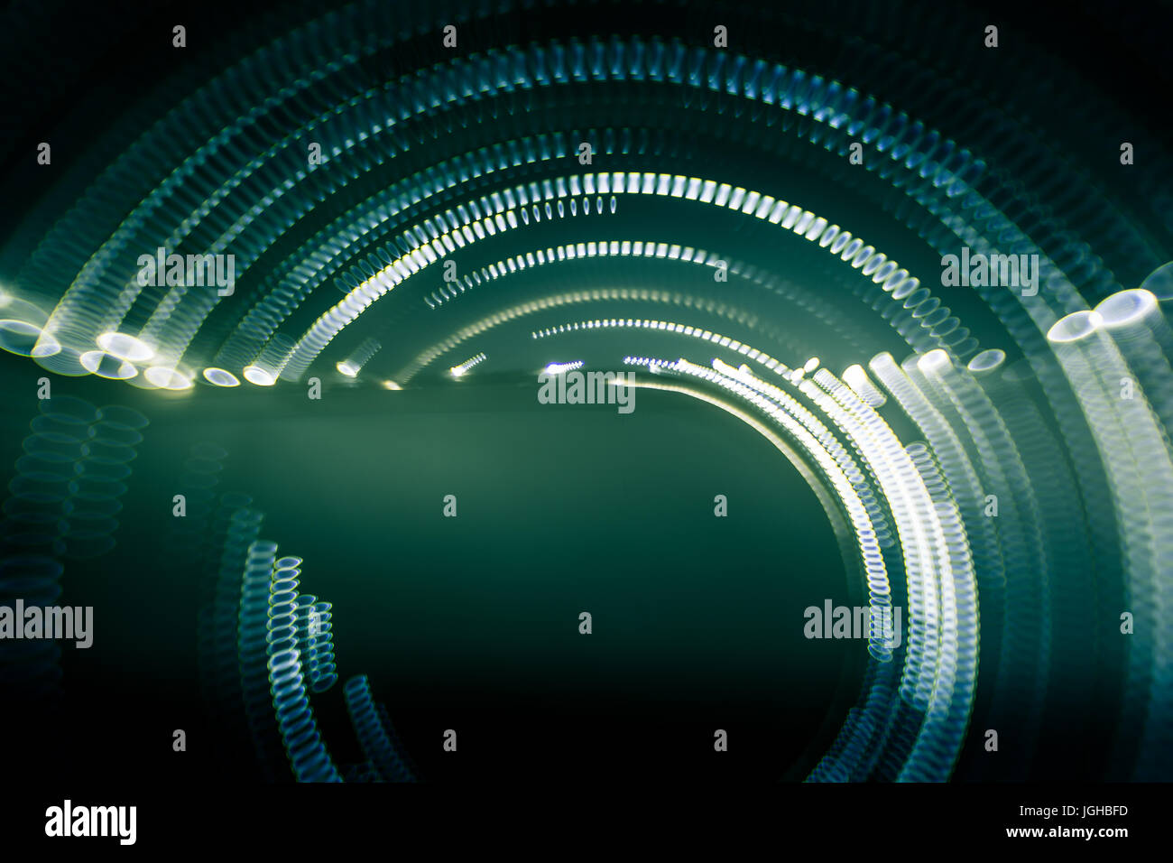 Colorful abstract trails of light. Dots, lines and bokeh on dark ...