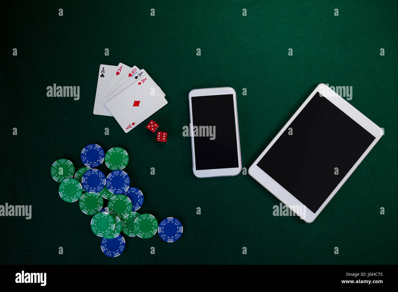Electronic gadgets, playing cards, mobile phone, dice and casino chips