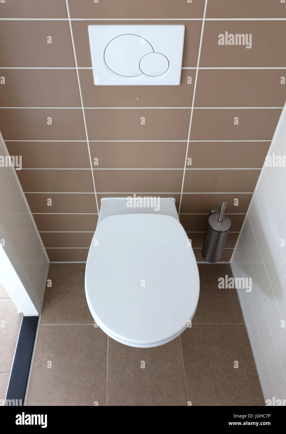Modern white toilet bowl in the bathroom Stock Photo - Alamy
