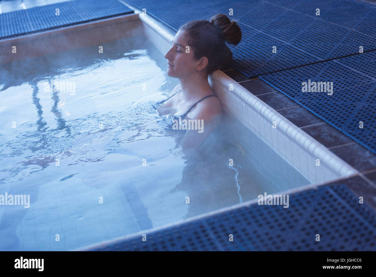 Woman relaxing in hot tub at home Stock Photo Alamy